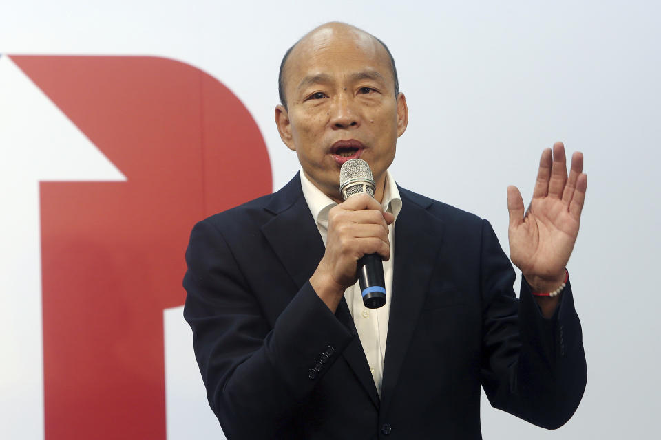 Han Kuo-yu of the Nationalist Party speaks during a media event announcing his campaign logo in Taipei, Taiwan, Thursday, Nov. 14, 2019. The China-friendly opposition candidate in Taiwan’s upcoming presidential election is urging Hong Kong to adopt universal suffrage as the best way of stemming months of anti-government protests. (AP Photo/Chiang Ying-ying)