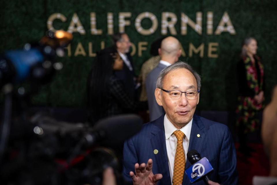 Nobel Prize-winning physicist Steven Chu speaks with news media at the California Hall of Fame’s red carpet event Tuesday, Dec. 13, 2022, before the induction ceremony at the California Museum in downtown Sacramento. Chu is a Stanford University professor and was the 12th U.S. Secretary of Energy — the first scientist to hold a Cabinet position, according to the museum.