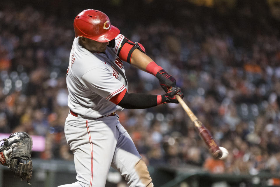 Cincinnati Reds' Donovan Solano hits an RBI single against the San Francisco Giants during the fifth inning of a baseball game in San Francisco, Friday, June 24, 2022. (AP Photo/John Hefti)