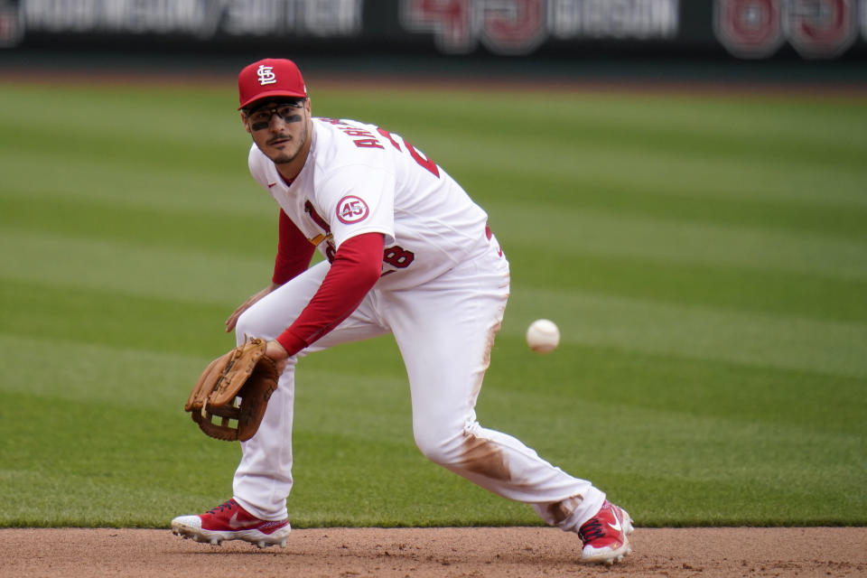 St. Louis Cardinals third baseman Nolan Arenado handles a grounder by New York Mets' Pete Alonso during the fifth inning of a baseball game Thursday, May 6, 2021, in St. Louis. Alonso reached base on a throwing error by Arenado on the play. (AP Photo/Jeff Roberson)