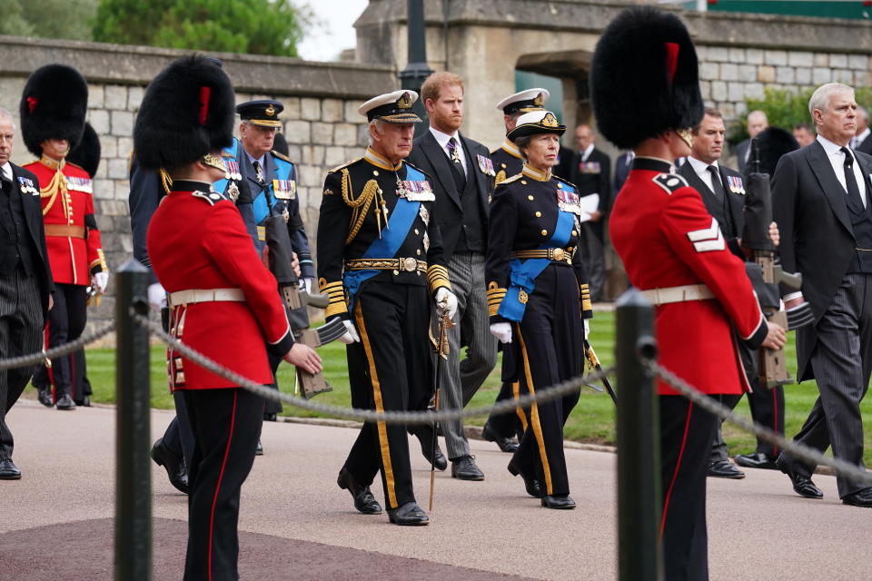 <p>The King and other members of the Royal Family follow the State Hearse as it arrives at St George's Chapel for the committal service. (PA)</p> 