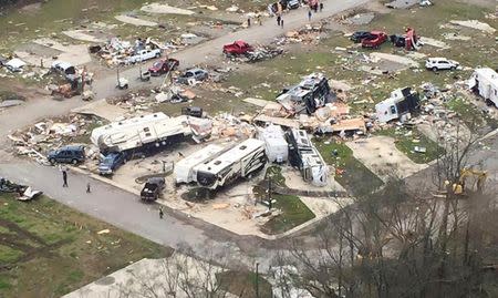 Wreckage covers the grounds of a mobile home park a day after it was hit by a tornado, in Convent, Louisiana February 24, 2016. REUTERS/Louisiana Governor's Office of Homeland Security and Emergency Preparedness/Handout via Reuters