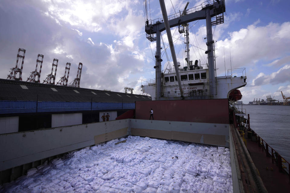 A cargo ship carrying humanitarian aid by Indian government for Sri Lankan people arrives at a port in Colombo, Sri Lanka, Sunday, May 22, 2022. The consignment, which consists of 9,000 MT of rice, 50 MT of milk powder and more than 25 MT of drugs and other medical supplies. (AP Photo/Eranga Jayawardena)