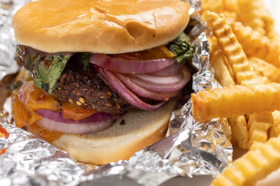 Chapli burger with fries at Jasmine Fusion Cuisine.(Jodi Miller)