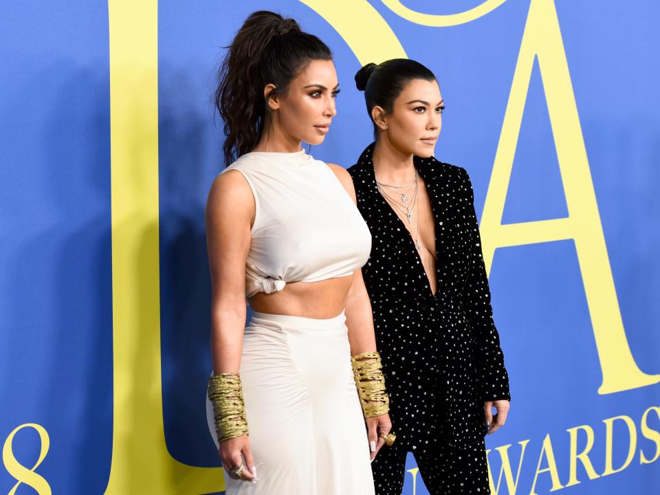 Kim Kardashian and Kourtney Kardashian on June 4, 2018 in New York City.