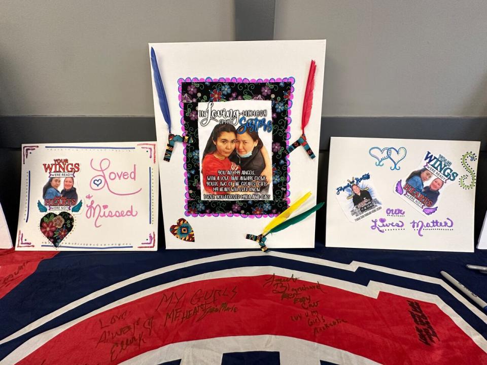 A display at a coroner's inquest in Whitehorse on April 8, 2024, commemorates two of the deceased women that are the focus of the inquest: Cassandra Warville, and Myranda Tizya-Charlie. The inquest is looking at the deaths of 4 women who died while accessing services at the Whitehorse emergency shelter in 2022 and 2023. (Virginie Ann/CBC - image credit)