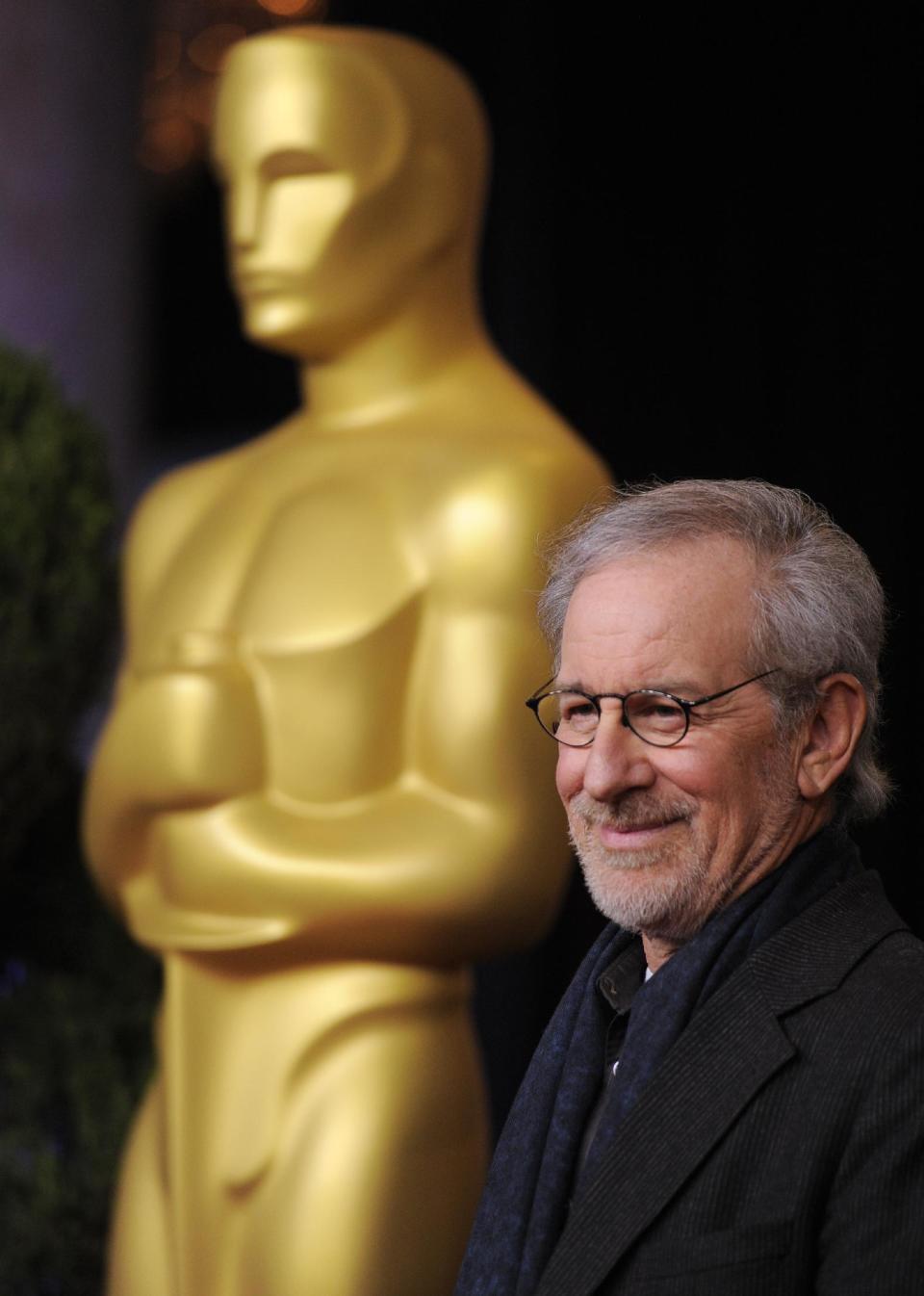 FILE - In this Monday, Feb. 4, 2013 photo, Steven Spielberg, nominated for directing and best picture for "Lincoln," arrives at the 85th Academy Awards Nominees Luncheon at the Beverly Hilton Hotel, in Beverly Hills, Calif. "Lincoln" leads the field with 12 Academy Awards nominations, including one for director Steven Spielberg. The 85th Academy Awards will be held in Los Angeles on Sunday, Feb. 24. (Photo by Chris Pizzello/Invision/AP, File)