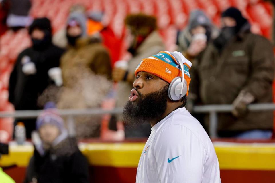 Miami Dolphins defensive tackle Christian Wilkins (94) looks on during pregame warmups before an NFL wild-card playoff football game against the Kansas City Chiefs at GEHA Field at Arrowhead Stadium in Kansas City, Missouri, on Saturday, January 13, 2024. Al Diaz/adiaz@miamiherald.com