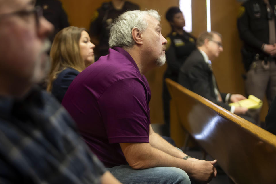 Steve St. Juliana listens during Jennifer Crumbley's trial at the Oakland County Courthouse, Wednesday, Jan. 31, 2024, in Pontiac, Mich. Crumbley, 45, is charged with involuntary manslaughter. Prosecutors say she and her husband were grossly negligent and could have prevented the four deaths if they had tended to their son’s mental health. They’re also accused of making a gun accessible at home. (Katy Kildee/Detroit News via AP, Pool)