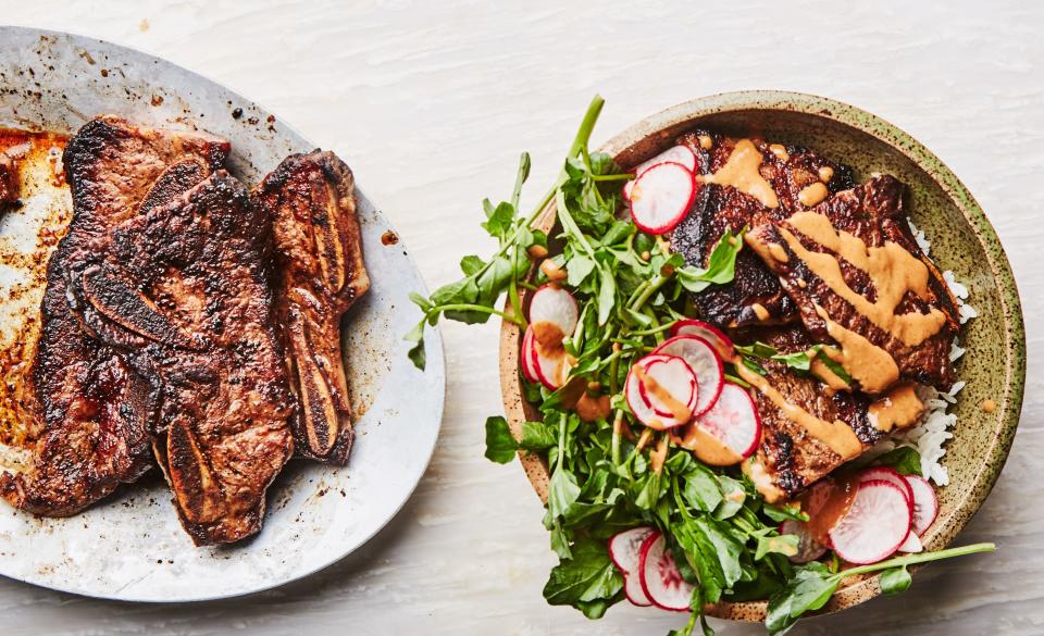 Build big flavor in a short amount of time by combining a few ready-made sauces. <a rel="nofollow noopener" href="https://www.bonappetit.com/recipe/miso-and-mayo-marinated-short-ribs-with-spicy-sauce?mbid=synd_yahoo_rss" target="_blank" data-ylk="slk:See recipe.;elm:context_link;itc:0;sec:content-canvas" class="link ">See recipe.</a>