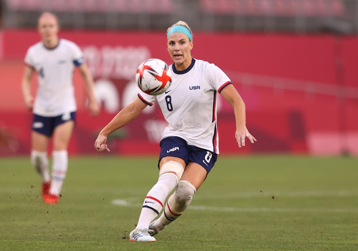 KASHIMA, JAPAN - AUGUST 02: Julie Ertz #8 of Team United States makes a pass during the Women's Semi-Final match between USA and Canada on day ten of the Tokyo Olympic Games at Kashima Stadium on August 02, 2021 in Kashima, Ibaraki, Japan. (Photo by Francois Nel/Getty Images)