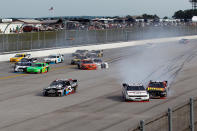 TALLADEGA, AL - MAY 05: Brad Keselowski, driver of the #22 Discount Tire Dodge, spins towards the inside wall during the NASCAR Nationwide Series Aaron's 312 at Talladega Superspeedway on May 5, 2012 in Talladega, Alabama. (Photo by Chris Graythen/Getty Images for NASCAR)