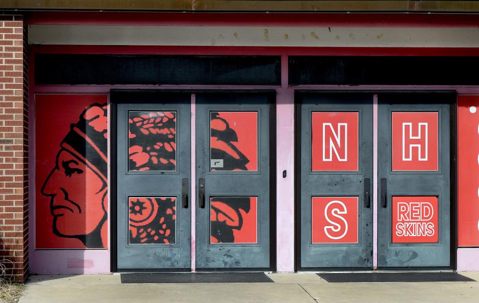 Entrance at Nokomis High School showing the head of a Native American and the school's mascot name Redskins Friday, March 22, 2024.