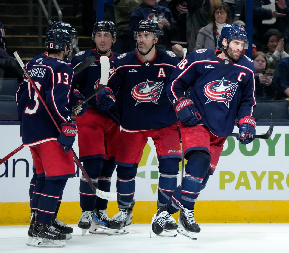 Feb. 10, 2024; Columbus, Ohio, USA; 
Columbus Blue Jackets center Boone Jenner (38) scores a goal during the third period of a hockey game against the Tampa Bay Lightning at Nationwide Arena on Saturday. The Lightning won the game 4-2.