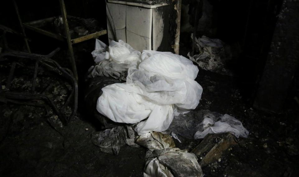 A view shows the aftermath of a fire that broke out during a wedding celebration, in the district of Hamdaniya in Mosul, Iraq, Wednesday, 27 September 2023 (AP)