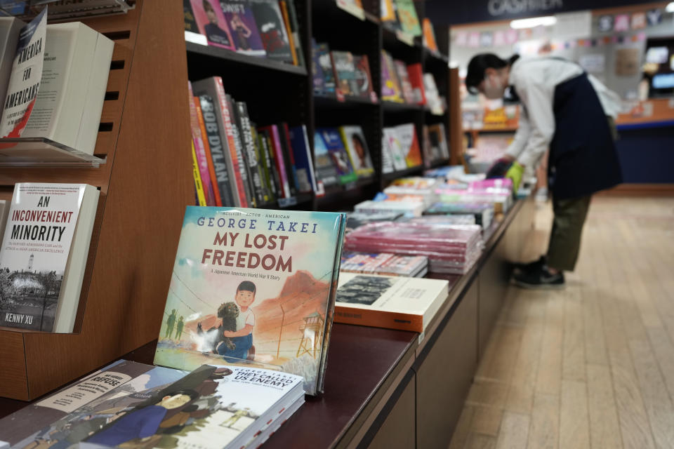 A copy of "My Lost Freedom," a children's book by George Takei, is displayed at the section featuring in the "Being Asian in America" at a Kinokuniya bookstore specializing in selling books and magazines written in foreign languages in the Shinjuku district of Tokyo, Wednesday, May 29, 2024. (AP Photo/Hiro Komae)