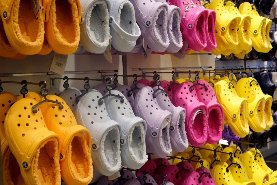 CHICAGO, ILLINOIS - JULY 22: Footwear is offered for sale at a Crocs retail store on July 22, 2021 in Chicago, Illinois. Crocs Inc. today reported second-quarter net income of $319 million, topping Wall Street expectations. (Photo by Scott Olson/Getty Images)