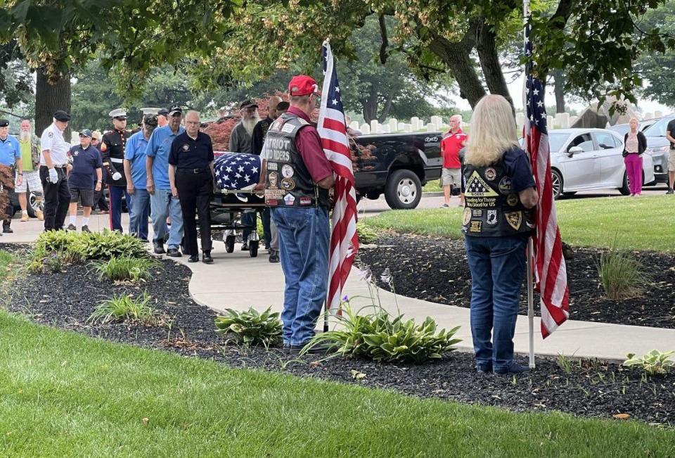 Dozens of people attended the funeral of local Marine veteran James Brooks at the Dayton National Cemetery Thursday. Brooks died at the Dayton VA recently, but had no known family members. (Xavier Hershovitz/Staff)