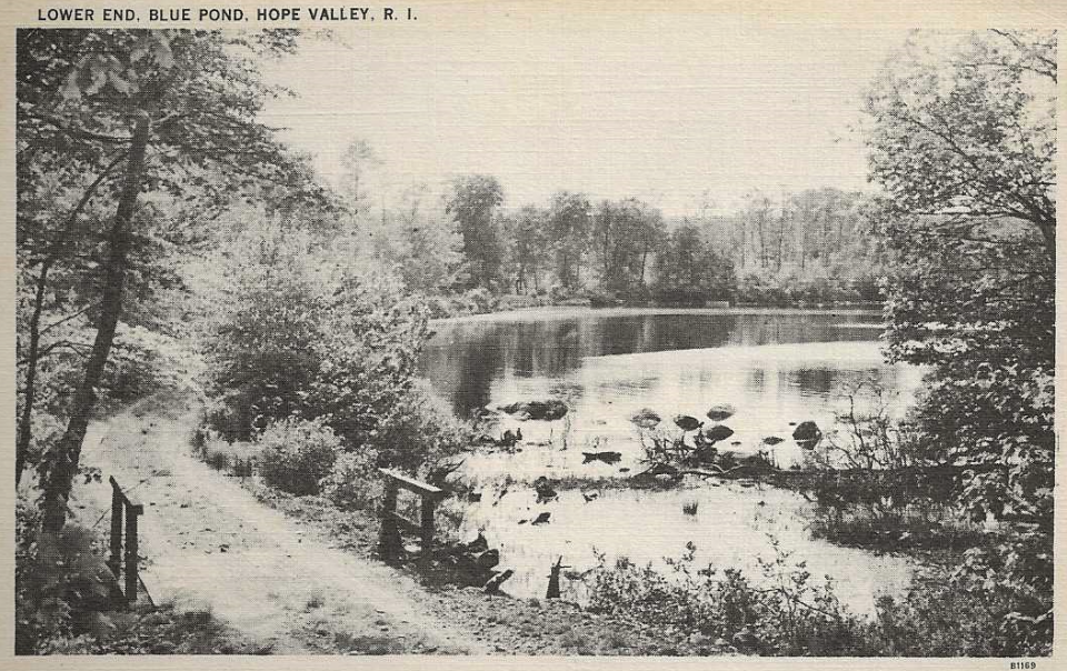 A dirt road once ran along the banks of Blue Pond, as seen in this vintage postcard.
