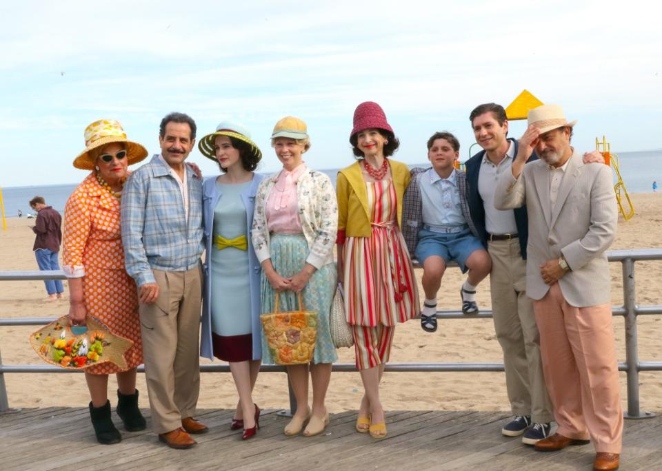 <p>The cast - Caroline Aaron, Tony Shalhoub, Rachel Brosnahan, Matilda Szydagis, Marin Hinkle, Michael Zegen, Matteo Pascale, and Kevin Pollak - posed for a family photo at Brooklyn's Coney Island on May 6. </p>