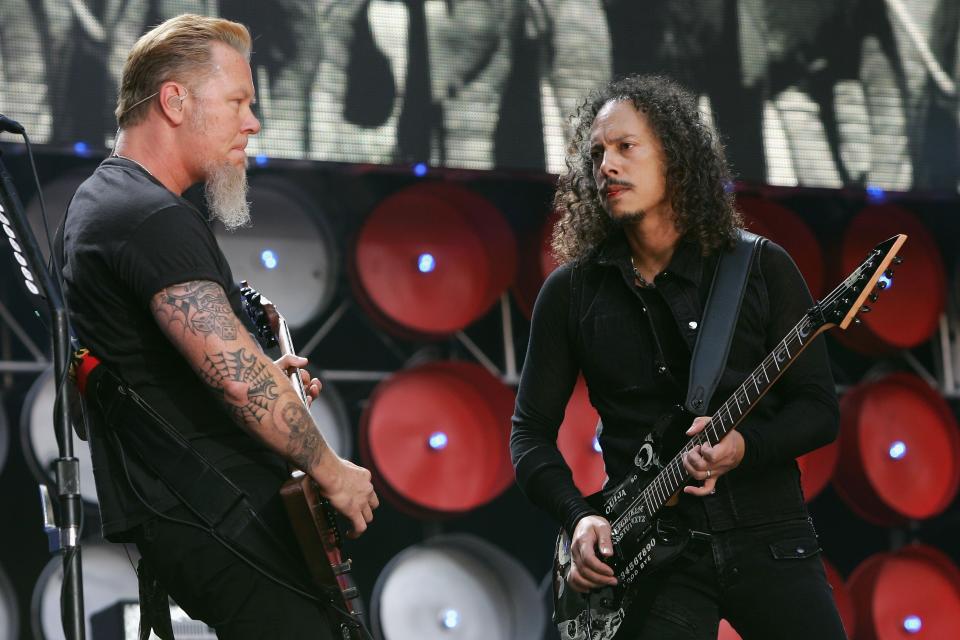 LONDON - JULY 07:  James Hetfield and Robert Trujillo of American rock metal band Metallica perform on stage during the Live Earth concert held at Wembley Stadium on July 7, 2007 in London. Live Earth is a 24-hour, 7-continent concert series taking place on 7/7/07, bringing together more than 100 music artists and 2 billion people to trigger a global movement to solve the climate crisis.  (Photo by Gareth Cattermole/Getty Images)