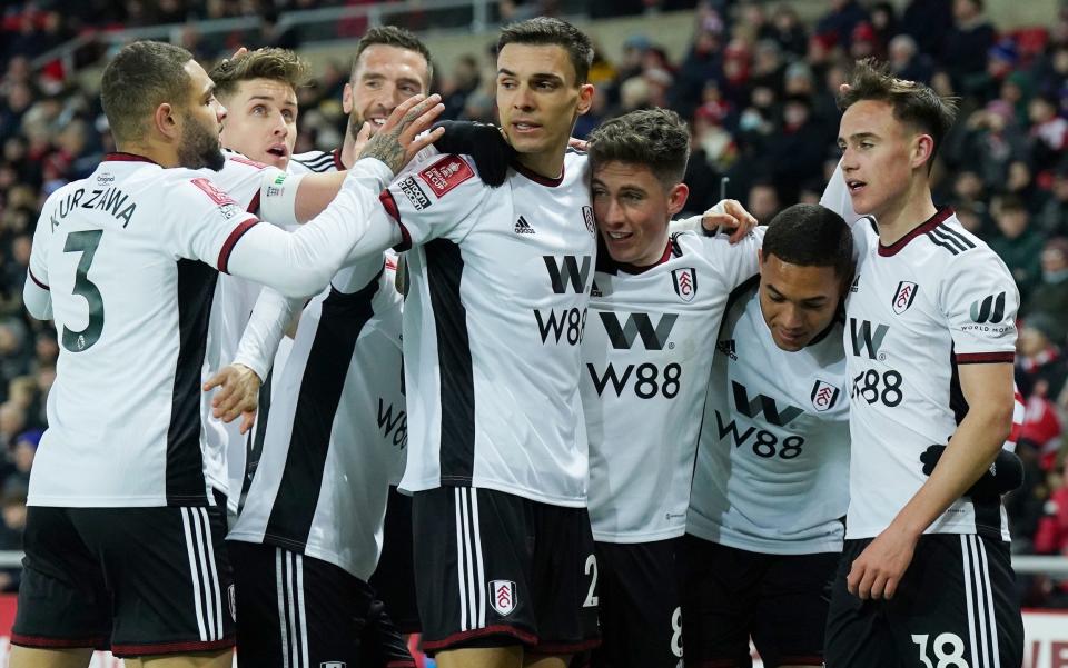 Fulham's Harry Wilson (third right) celebrates scoring his side's first goal - PA/Owen Humphreys