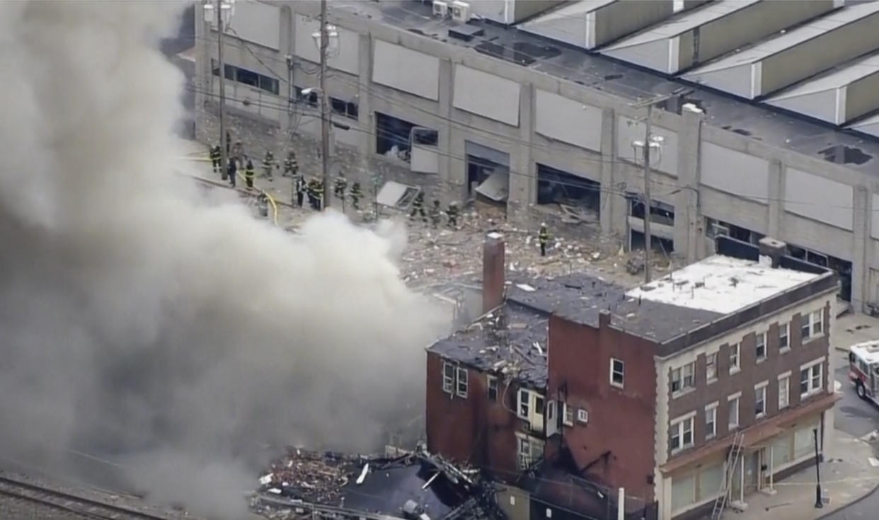 In this screen grab from video provided by WPVI-TV/6ABC, smoke rises from an explosion at the R.M. Palmer Co. plant in West Reading, Pa., Friday, March 24, 2023. (WPVI-TV/6ABC via AP)