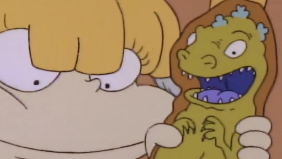 Angelica holding an unopened Reptar bar on Rugrats