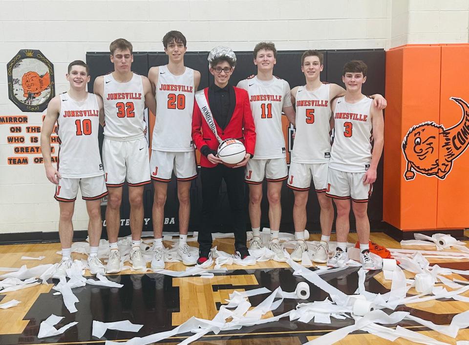 Seniors Carter Rounds (10), Wade Sommers (32), Gavin Van Kampen (20), David Fowler (middle - Homecoming King), Micah Calligan (11), Warrick Elder (5) and Carter Baker (3) played their final game for Jonesville basketball.