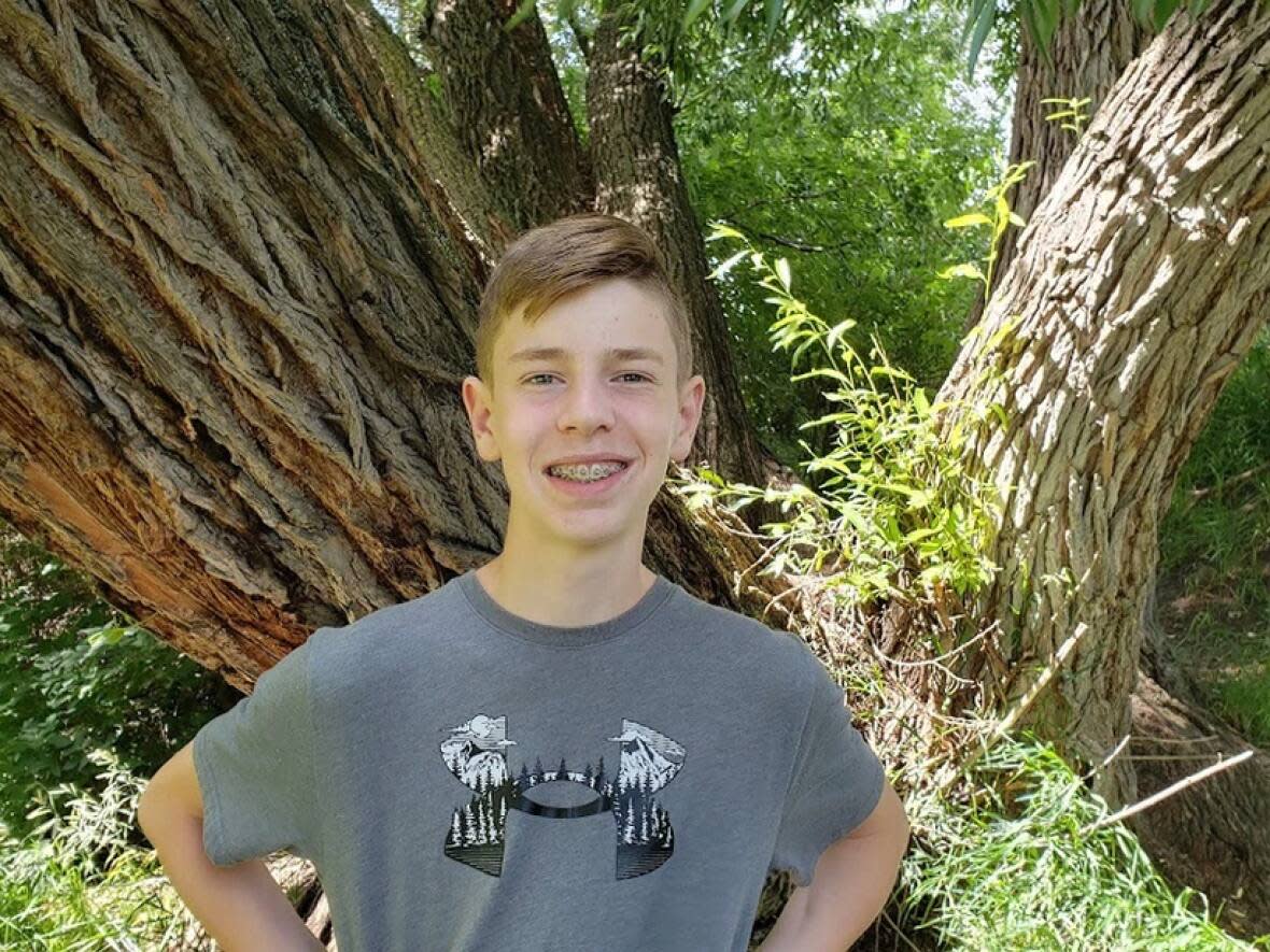 Local tree enthusiast and grade nine student Joshua Kirsch says his grade one tree is unfortunately dead.  (Submitted by Dustin Bajer - image credit)