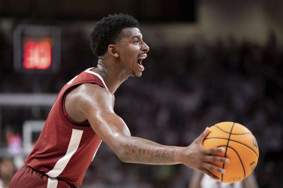 Alabama guard Jaden Bradley shouts to teammates during the second half of an NCAA college basketball game against South Carolina Wednesday, Feb. 22, 2023, in Columbia, S.C. Alabama won 78-76 in overtime. (AP Photo/Sean Rayford)