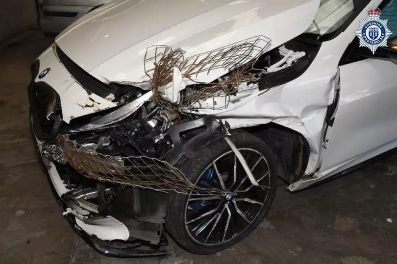 The damaged BMW following the crash