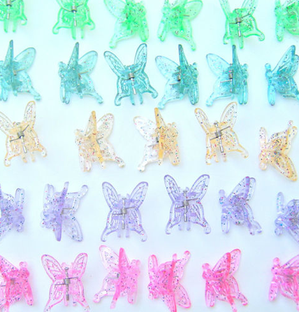 <div class="caption-credit"> Photo by: Ebay</div><div class="caption-title">Plastic Butterfly Clips</div>Whether we clipped a few at the base of our ponytail or adorned our heads with a rainbow butterfly tiara, this was thee accessory of the '90s girl - well into high school and beyond. Yet they really only look cute on kids under, like, 10. <br> <i>Buy from <a rel="nofollow noopener" href="http://www.ebay.com/itm/4-dozen-BUTTERFLY-HAIR-CLIPS-48-Jaw-Claw-Hard-plastic-SPARKLY-GLITTER-PINK-PURP-/171029205935?pt=US_Girls_Accessories&hash=item27d22293af" target="_blank" data-ylk="slk:eBay;elm:context_link;itc:0;sec:content-canvas" class="link ">eBay</a>, $4.99</i>