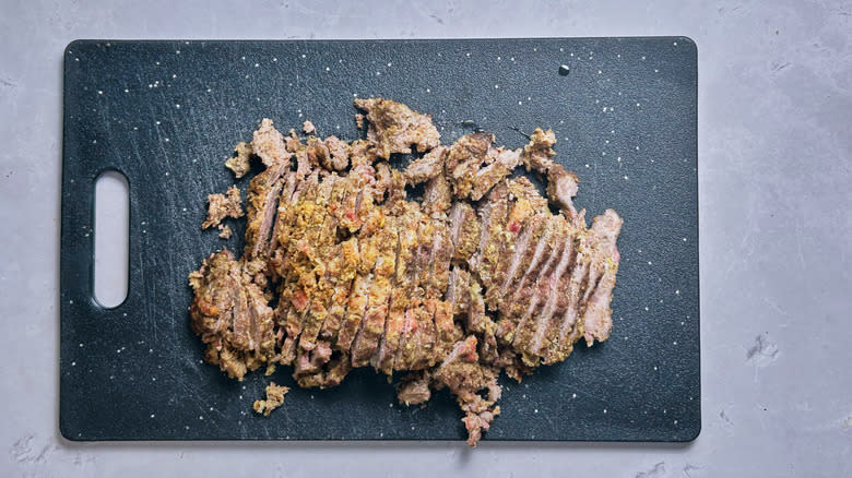 sliced gyro meat on a cutting board