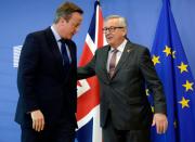 British Prime Minister David Cameron (left) meets European Union Commission President Jean-Claude Juncker in Brussels on June 28, 2016