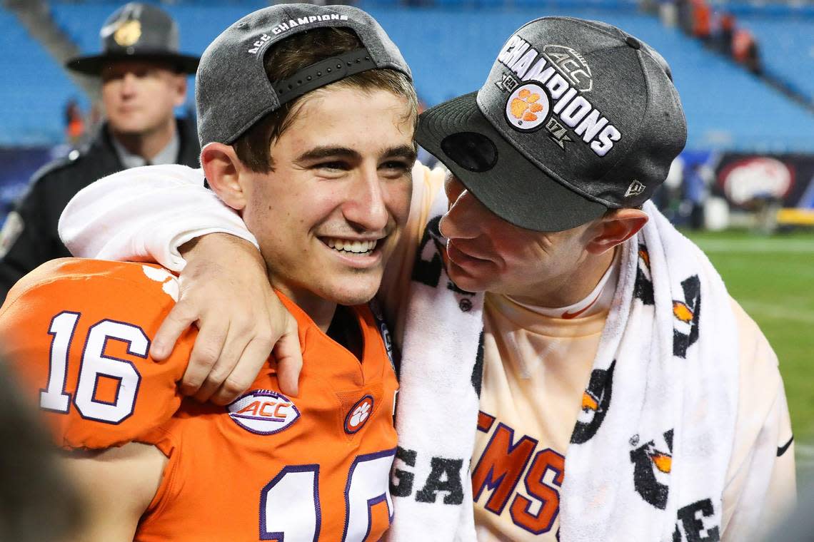 Dec 2, 2017; Charlotte, NC, USA; Clemson Tigers head coach Dabo Swinney gives his son Will a kiss during the post game celebration of the ACC championship game between the Clemson Tigers and the Miami Hurricanes at Bank of America Stadium.