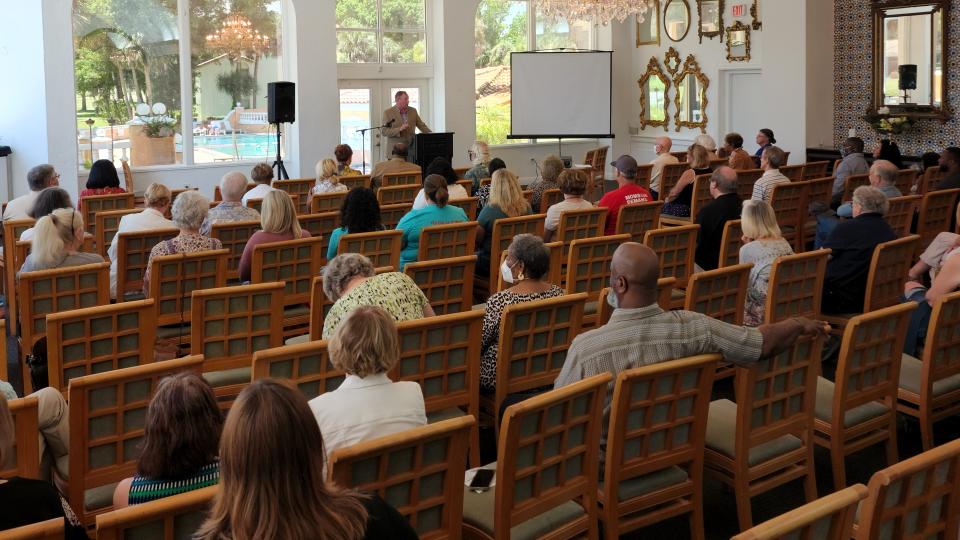 History professor J. Michael Butler spoke to a crowd of about 60 about critical race theory at a community discussion in Titusville.