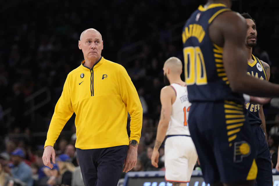 Indiana Pacers' head coach Rick Carlisle looks over at his players during the first half of an NBA basketball game against the New York Knicks, Sunday, April 9, 2023, in New York. (AP Photo/Seth Wenig)