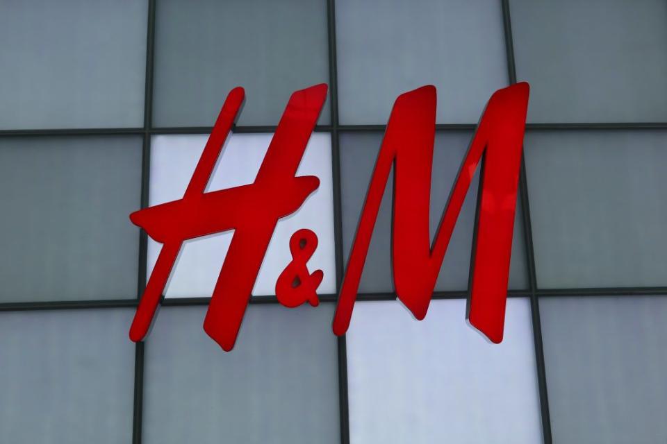 An H&M corporate logo hangs on a wall outside their store at the Eaton Center shopping mall on July 26, 2023, in Toronto, Canada. (Gary Hershorn/Getty Images)