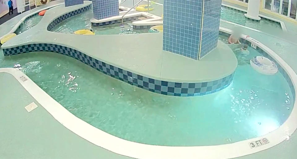 His friend can be seen holding the grate as he inspects what is below. Source: North Myrtle Beach Police