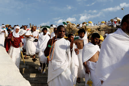 Muslim pilgrims gather on Mount Mercy on the plains of Arafat during the annual haj pilgrimage, outside the holy city of Mecca, Saudi Arabia August 20, 2018. REUTERS/Zohra Bensemra