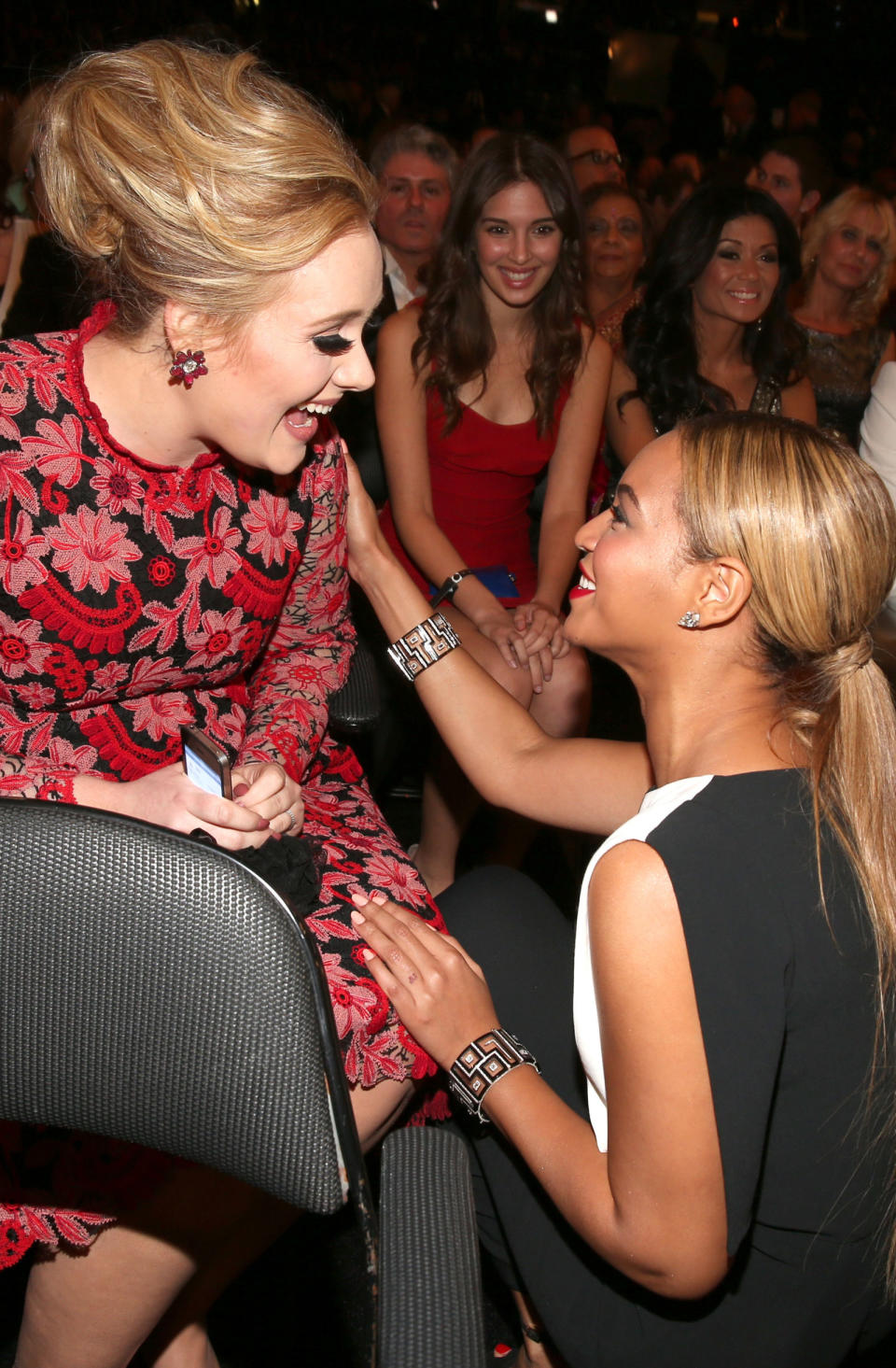 <p>Adele beams saying hi to Beyoncé at the 2013 Grammys. Adele's first (off-camera) meeting was in 2010. Adele was incredibly nervous: "I had a full-blown anxiety attack," she told <a rel="nofollow noopener" href="http://www.mtv.com/news/1661950/adele-beyonce-rolling-stone/" target="_blank" data-ylk="slk:MTV;elm:context_link;itc:0;sec:content-canvas" class="link ">MTV</a>. "Then she popped in looking gorgeous, and said, 'You're amazing! When I listen to you I feel like I'm listening to God.'"</p>