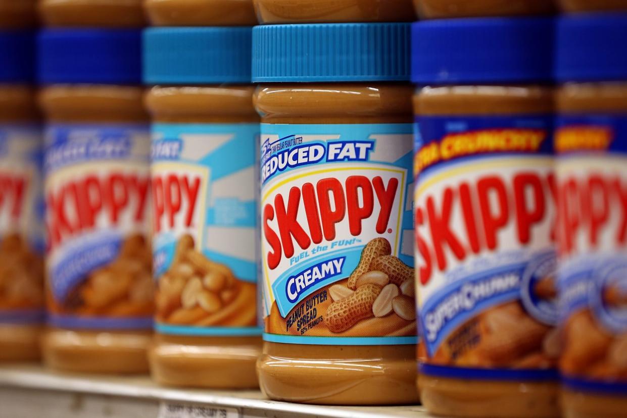 jars of skippy peanut butter on store shelf