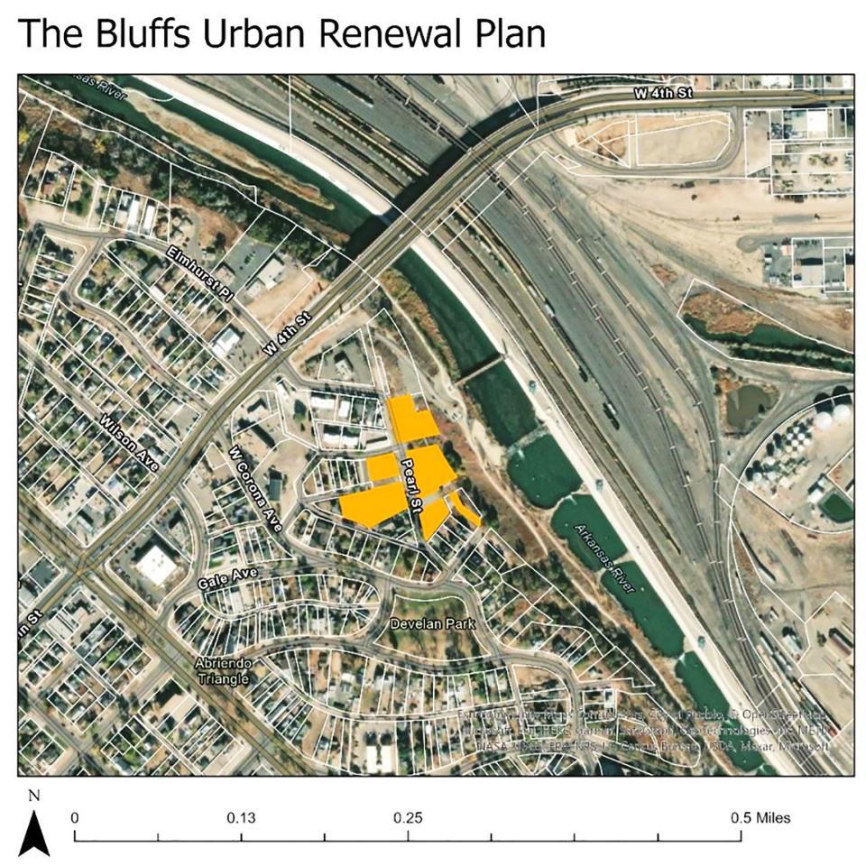 In this aerial photo, the area in yellow shows where The Bluffs Urban Renewal Plan will be built in Pueblo just west of Midtown Center and the Arkansas River.