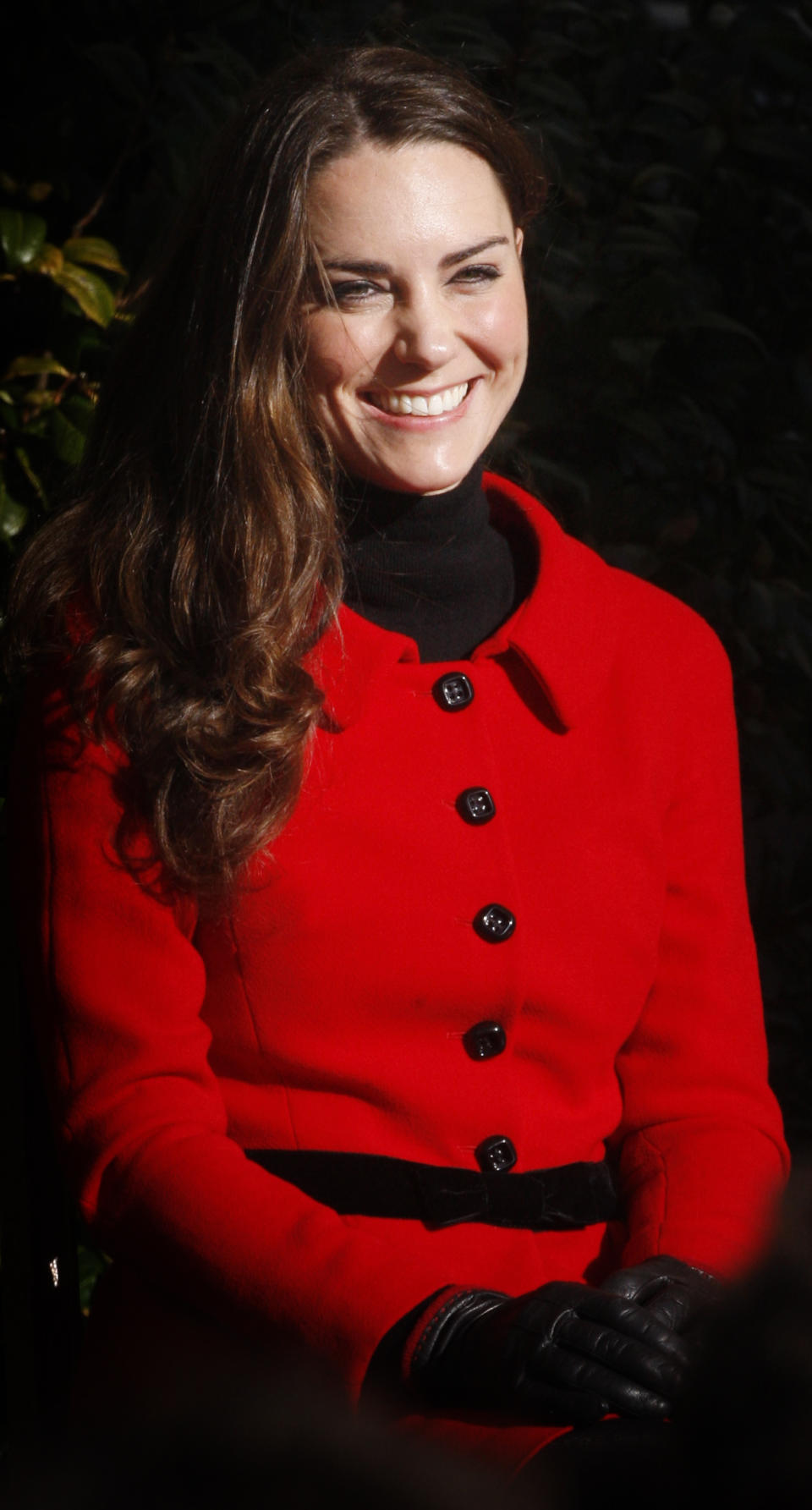 Prince William's fiancee Kate Middleton smiles during a visit to the University of St Andrews in Scotland on February 25, 2011. During the visit they viewed the surviving Papal Bull (the university's founding document), unveiled a plaque, and met a selection of the Universitys current staff and students to mark the start of the Anniversary. Prince William and Kate Middleton attended the university as students from 2001 to 2005 and began their romance in St Andrews.2011. AFP PHOTO/WPA POOL/DANNY LAWSON (Photo credit should read DANNY LAWSON/AFP/Getty Images)