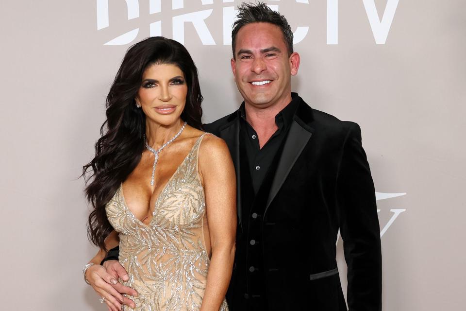 <p>Monica Schipper/Getty</p> Teresa Giudice and Louie Ruelas