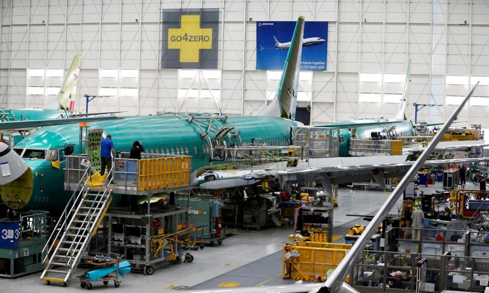 <span>People work on a 737 Max aircraft at the Boeing factory in Renton, Washington, on 27 March 2019.</span><span>Photograph: Lindsey Wasson/Reuters</span>