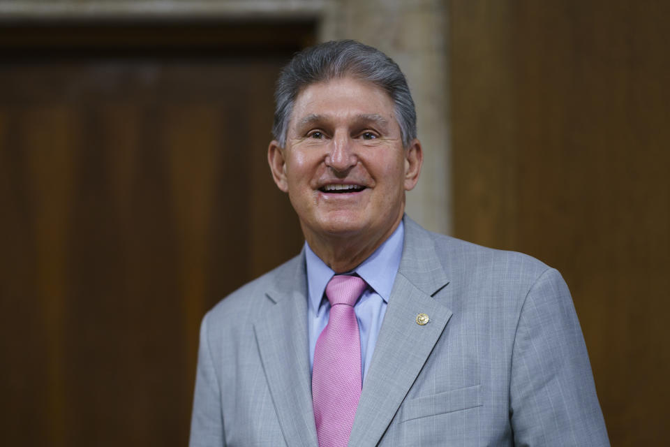 Sen. Joe Manchin, D-W.Va., chair of the Senate Energy and Natural Resources Committee, arrives to hold a confirmation hearing for Tommy Beaudreau of Alaska, to be deputy secretary of the Department of the Interior, at the Capitol in Washington, Thursday, April 29, 2021. (AP Photo/J. Scott Applewhite)