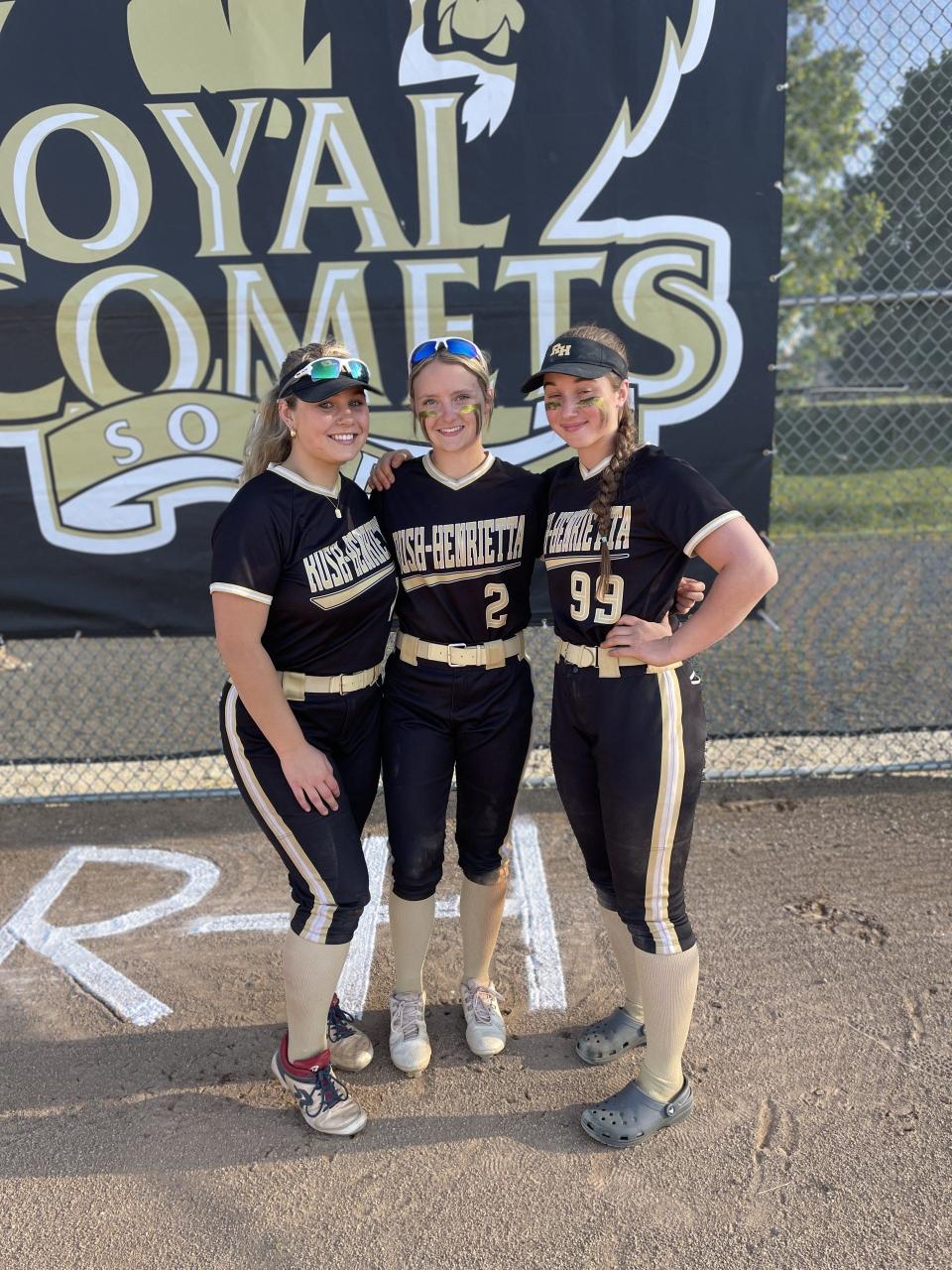 Rush-Henrietta's Olivia Sheffer, Kadyn Hartel and Elizabeth Gleghorn after a 15-0 win over Brighton to clinch what is believed to be program's first Section V final.