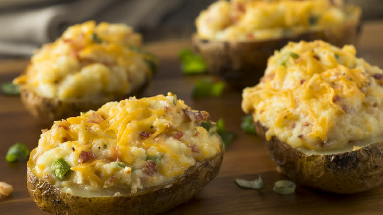 Baked potatoes with bacon.